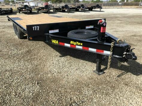 skid steer and trailer rental|20 ft flatbed trailer rental.